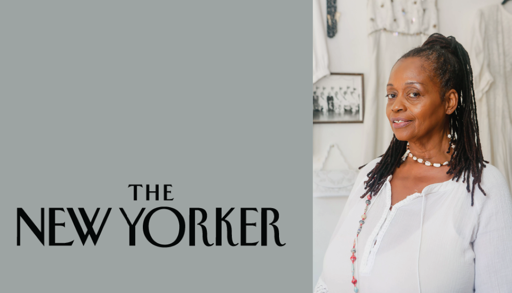 At left, in a gray rectangle, the black logo for The New Yorker. At right, Ayodele Nzingha, a Black woman with thin locks pulled into a high ponytail. The stands in a white room, wearing a white gauzy blouse and a white cowrie shell necklace.