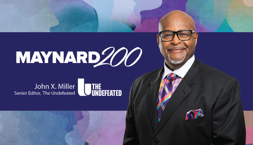 Over a colorful collage background, a blue rectangle and cutout photo of John X. Miller, a Black man, bald, with a distinguished look including black glasses, a black suit, a colorful plaid shirt with a white collar, and a colorful tie and matching pocket square. In white: The Maynard 200 logo and the logo for The Undefeated, with white text that reads "John X. Miller, Senior Editor, The Undefeated."