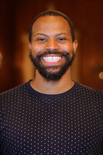 Rasheed smiling
